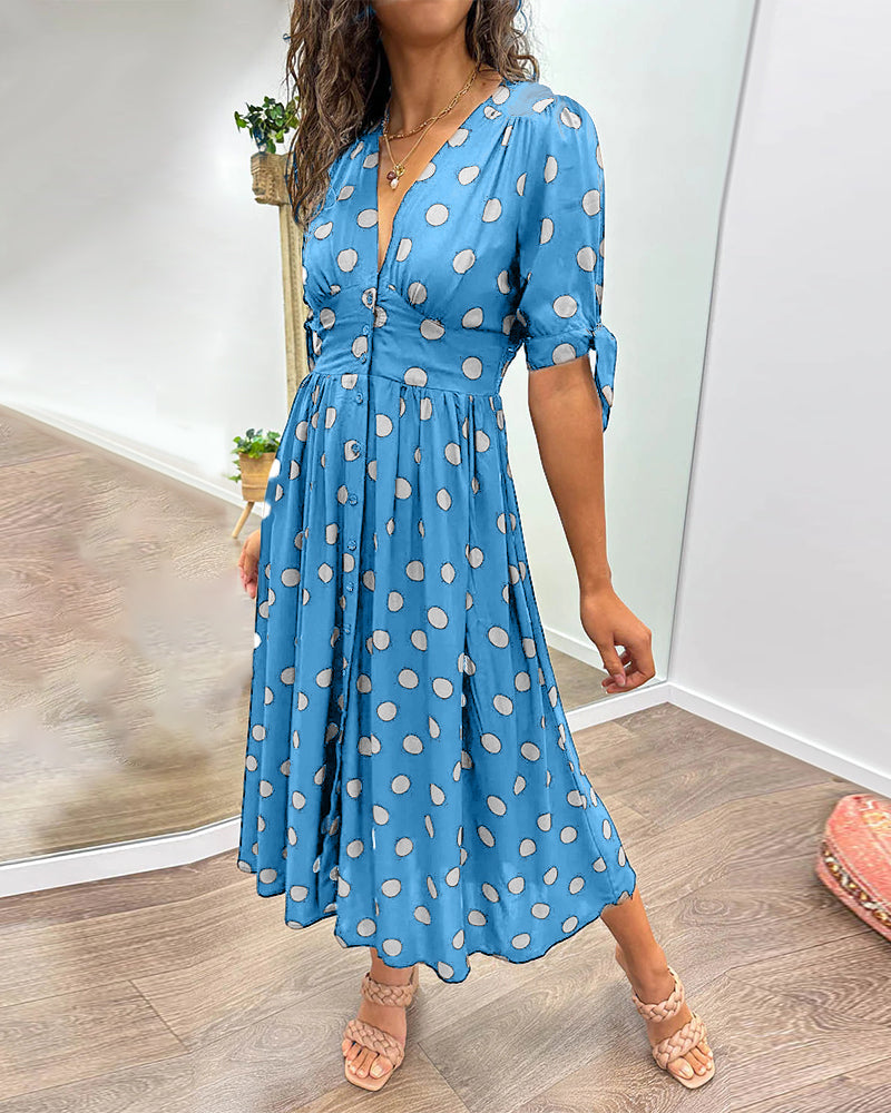 Kleid mit tiefem V-Ausschnitt und Polka Dots
