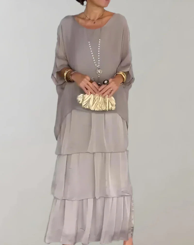 WW | Elegantes Maxikleid mit Fledermausärmeln und Gestuftem Rundhalsausschnitt