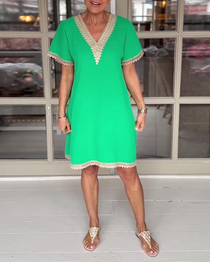 WW | Elegante Kleid mit Spitzenpaneelen und V-Ausschnitt