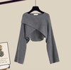 Grauer Pullover