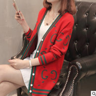 Damen Strickjacke mit tiefem V-Ausschnitt und bunten grafischen Mustern WW