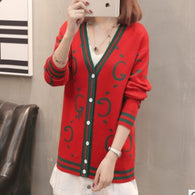 Damen Strickjacke mit tiefem V-Ausschnitt und bunten grafischen Mustern WW