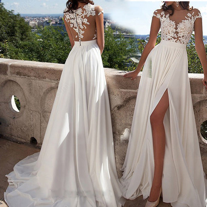 Damen Abendkleid aus Spitze mit floraler Verzierung, Beinschlitz und transparentem Rücken