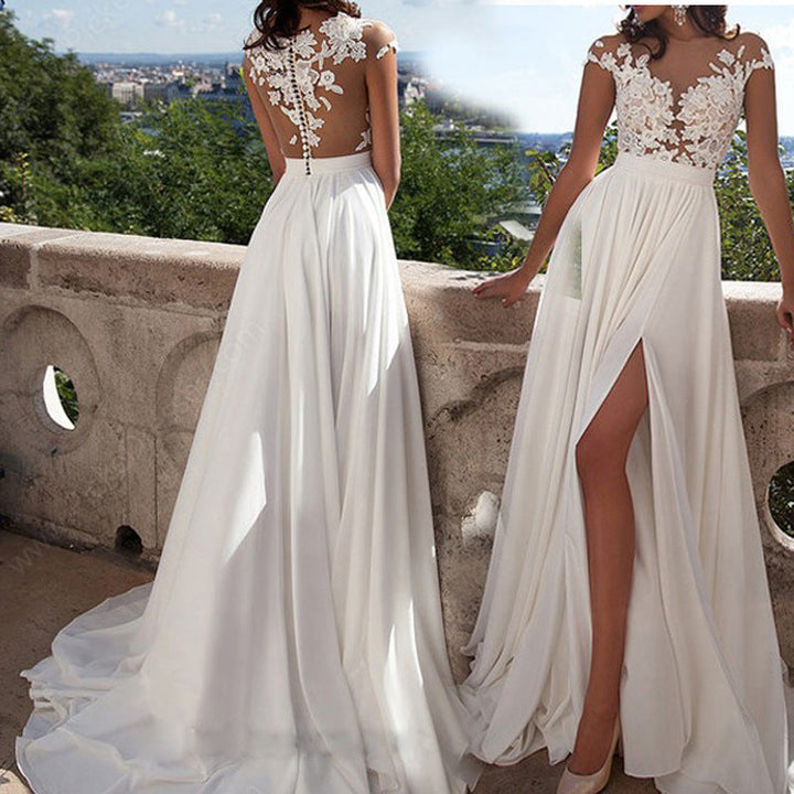Damen Abendkleid aus Spitze mit floraler Verzierung, Beinschlitz und transparentem Rücken