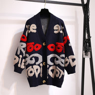 Damen Strickjacke mit buntem Design und großen Knöpfen WW