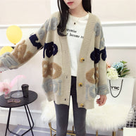 Damen Strickjacke mit buntem grafischen Design und gemütlichen Knöpfen WW