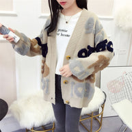 Damen Strickjacke mit buntem grafischen Design und gemütlichen Knöpfen WW