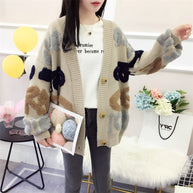 Damen Strickjacke mit buntem grafischen Design und gemütlichen Knöpfen WW