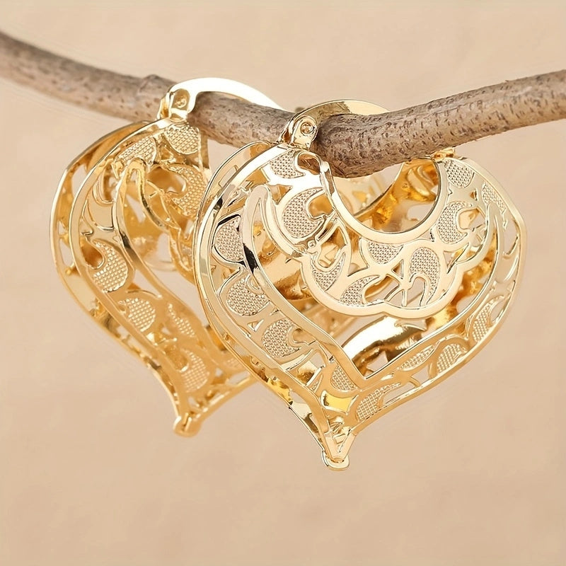 WW | 14kt Gold Romantische Herzförmige Creolen