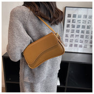 WW | Kompakte Damen Schultertasche