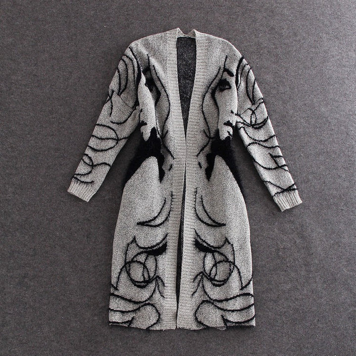Damen Strickkleid mit künstlerischem Design und eleganter Silhouette W&W Mode