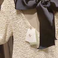 WW Kleid | Elegantes Glitzerkleid mit Schleifenverschluss am Rücken