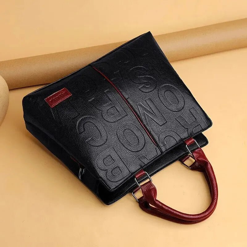 WW – Damenhandtasche aus weichem Leder mit geprägtem Buchstabendesign