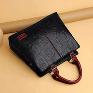 WW – Damenhandtasche aus weichem Leder mit geprägtem Buchstabendesign