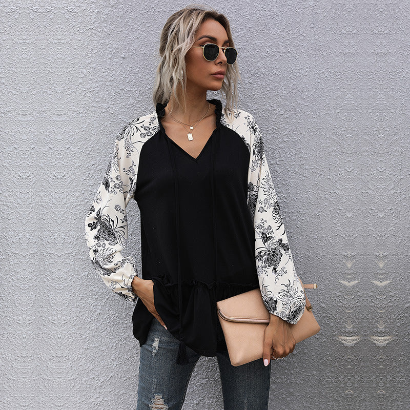 Damen Kapuzenpullover mit floralem Design und peplum Schnitt W&W Mode