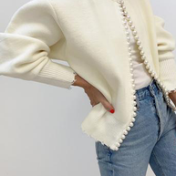 Strickjacke mit Perlmuttknöpfen