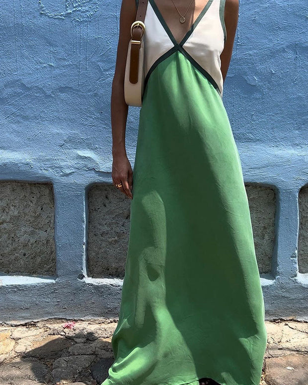 Schickes Kleid mit V-Ausschnitt und kontrastierenden Farben