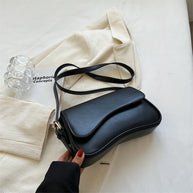 WW | Kompakte Damen Schultertasche
