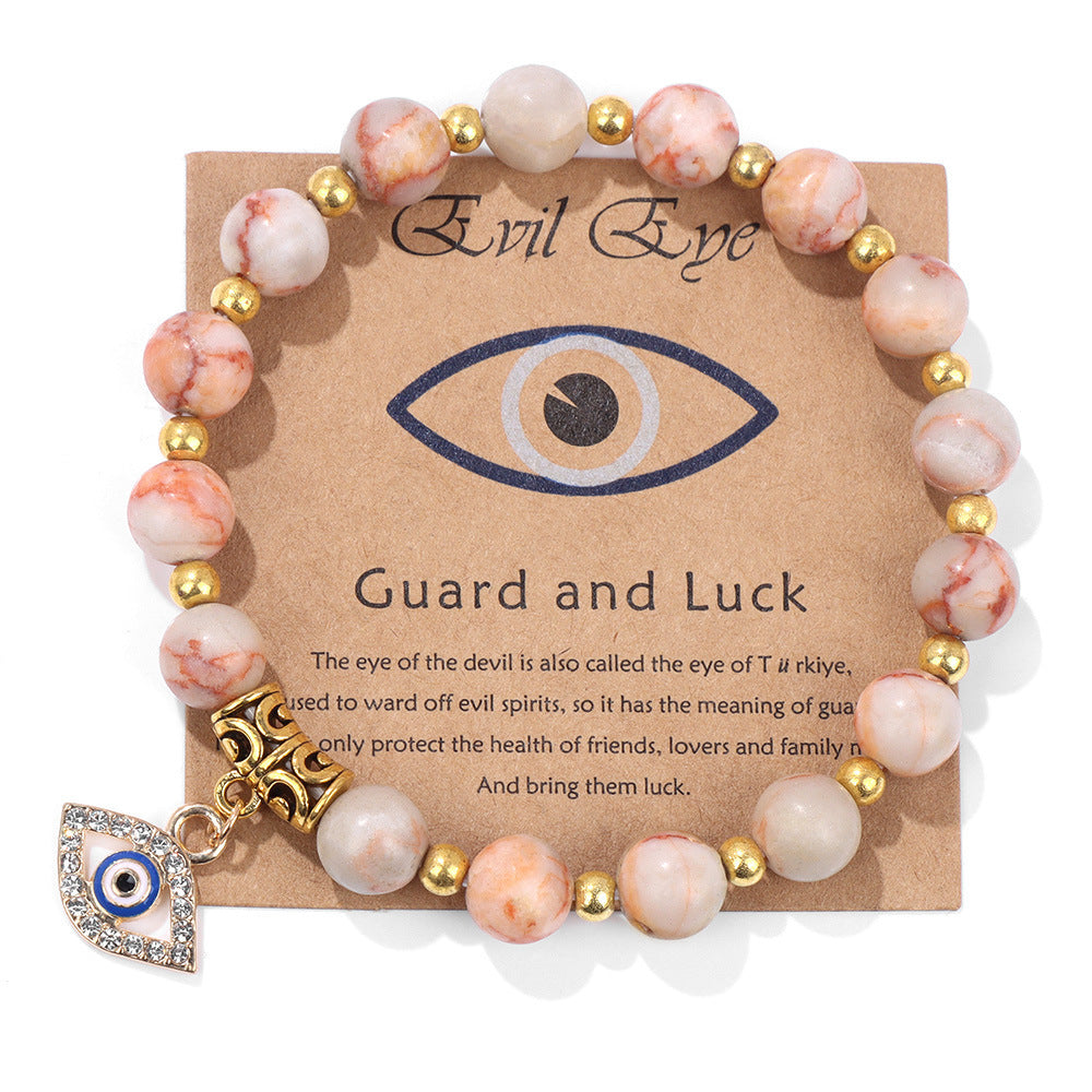 Perlenarmband mit Blatt-, Herz- und Sternmotiven