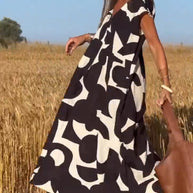 Amara™ - Maxikleid mit Print und V-Ausschnitt