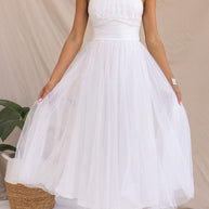 Feminines Sommerkleid mit fließendem Rock & eleganter Silhouette