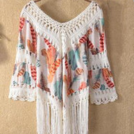 Damen lässiger Strandponcho mit fransigen Details und trendigem Muster WW