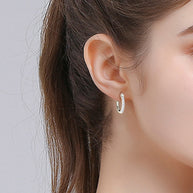 WW | 925 Sterling Silber Moissanit Huggie Ohrringe
