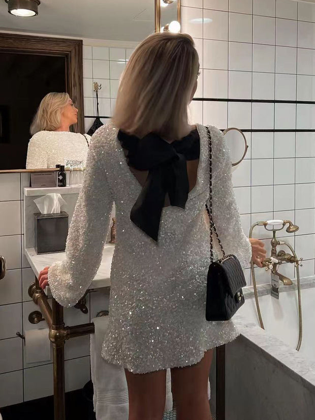 WW Kleid | Elegantes Glitzerkleid mit Schleifenverschluss am Rücken