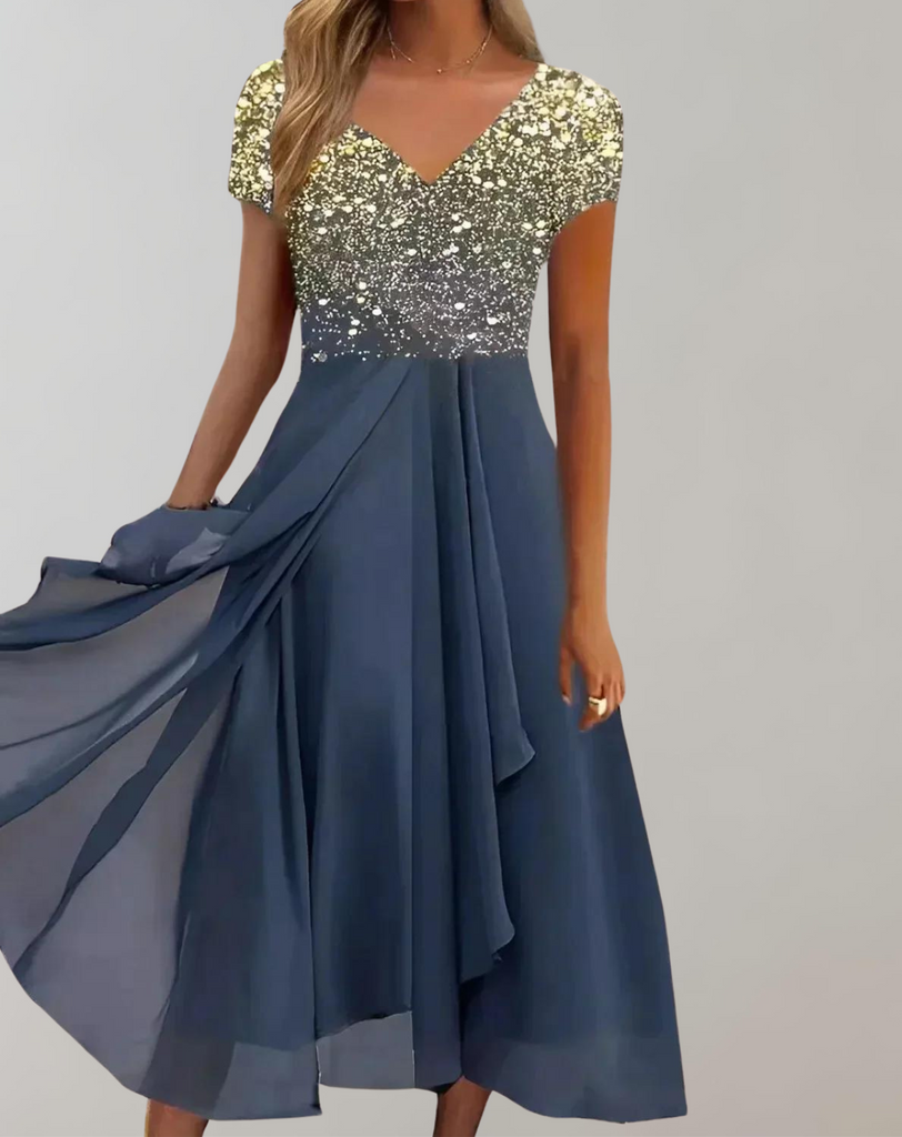 Luméa™ – Elegantes Abendkleid mit Blumen-Glanz & fließendem Rock