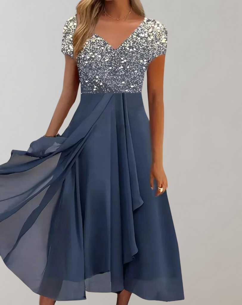 Luméa™ – Elegantes Abendkleid mit Blumen-Glanz & fließendem Rock