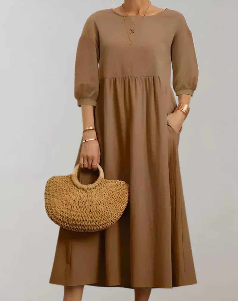 WW | Locker Geschnittenes Midikleid mit 3/4-Ärmeln, Rundhalsausschnitt und Tasche