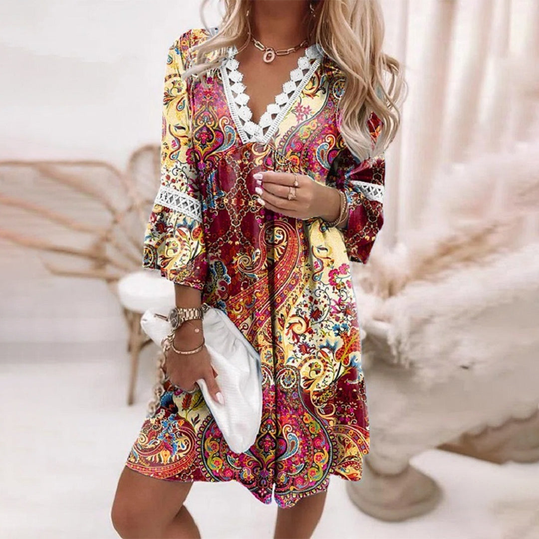 W&W Mode - Besticktes V-Ausschnitt Kleid