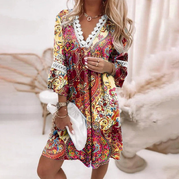 WW - Besticktes V-Ausschnitt Kleid