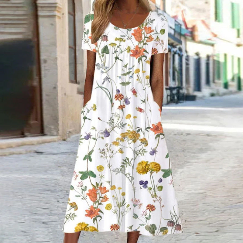 WW – Maxikleid im Bohemian-Stil mit Blumenmuster und Taschen | Kurzärmliges Maxikleid mit Blumenmuster im Boho-Chic-Stil für Damen