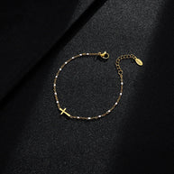 WW | Goldfarbene Kreuzarmband