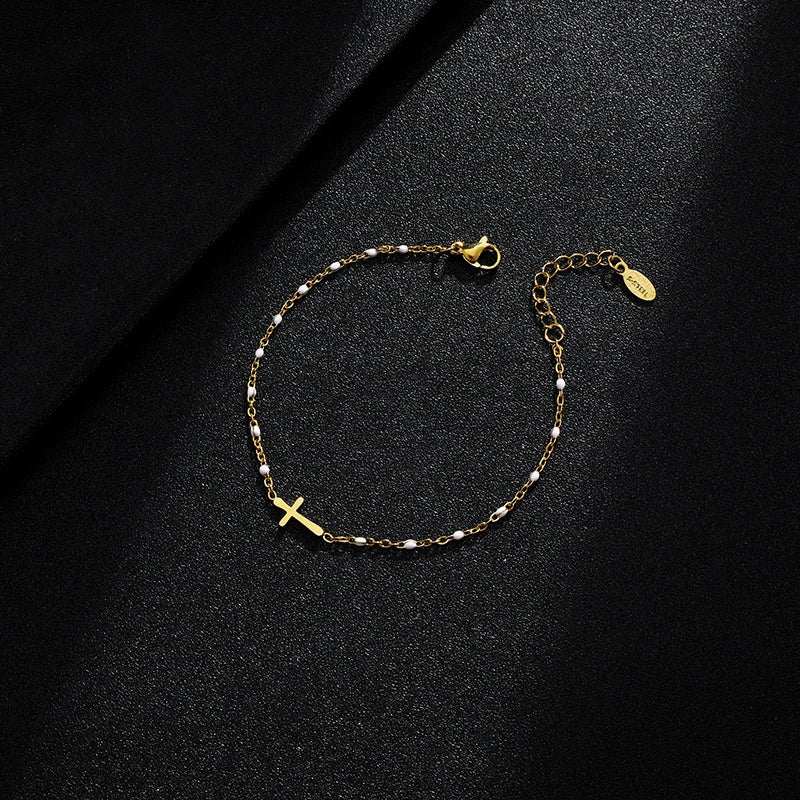 WW | Goldfarbene Kreuzarmband