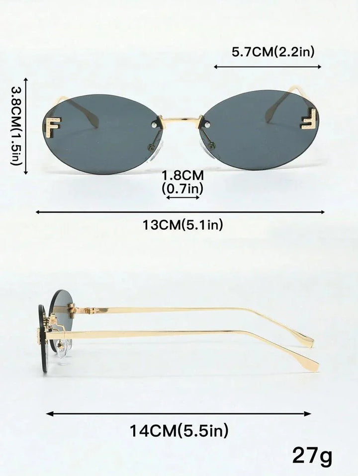 W&W Mode | Ovale Sonnenbrille Mit Goldenen Akzenten Und Subtilen Steinen