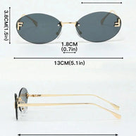 WW | Ovale Sonnenbrille Mit Goldenen Akzenten Und Subtilen Steinen