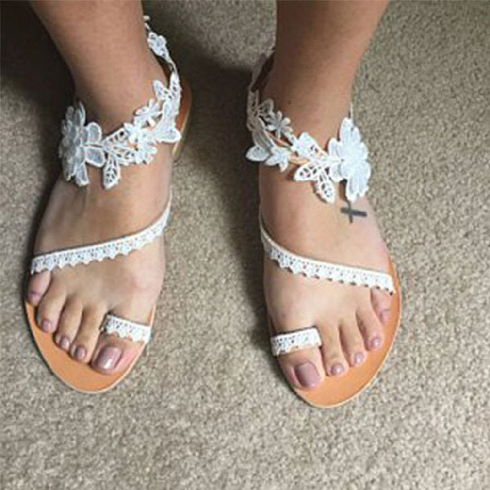 Damen Spitzensandalen mit Blumenmuster und flacher Sohle