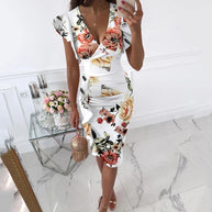 WW | Kleid mit Rüschensäumen und V-Ausschnitt