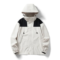 Beige wind- und wasserdichte Outdoor-Kapuzenjacke mit langen Ärmeln und farblich abgestimmtem Reißverschluss
