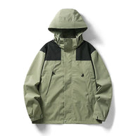 Grün wind- und wasserdichte Outdoor-Kapuzenjacke mit langen Ärmeln und farblich abgestimmtem Reißverschluss