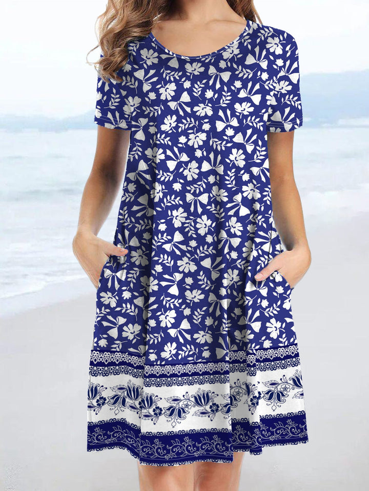 Damen Freizeitkleid mit verspieltem Blumendruck und praktischen Taschen W&W Mode
