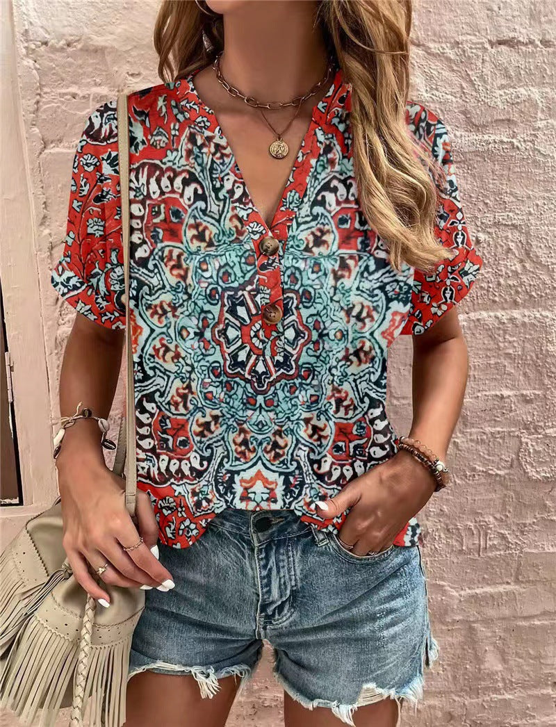 Damen Kurzarm Bluse mit dekorativem Musterdruck und knöpfbarem Ausschnitt W&W Mode