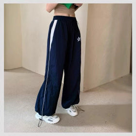 Damen Sportliche Weite Hose mit seitlichen Streifen und elastischem Bund W&W Mode