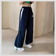 Damen Sportliche Weite Hose mit seitlichen Streifen und elastischem Bund WW