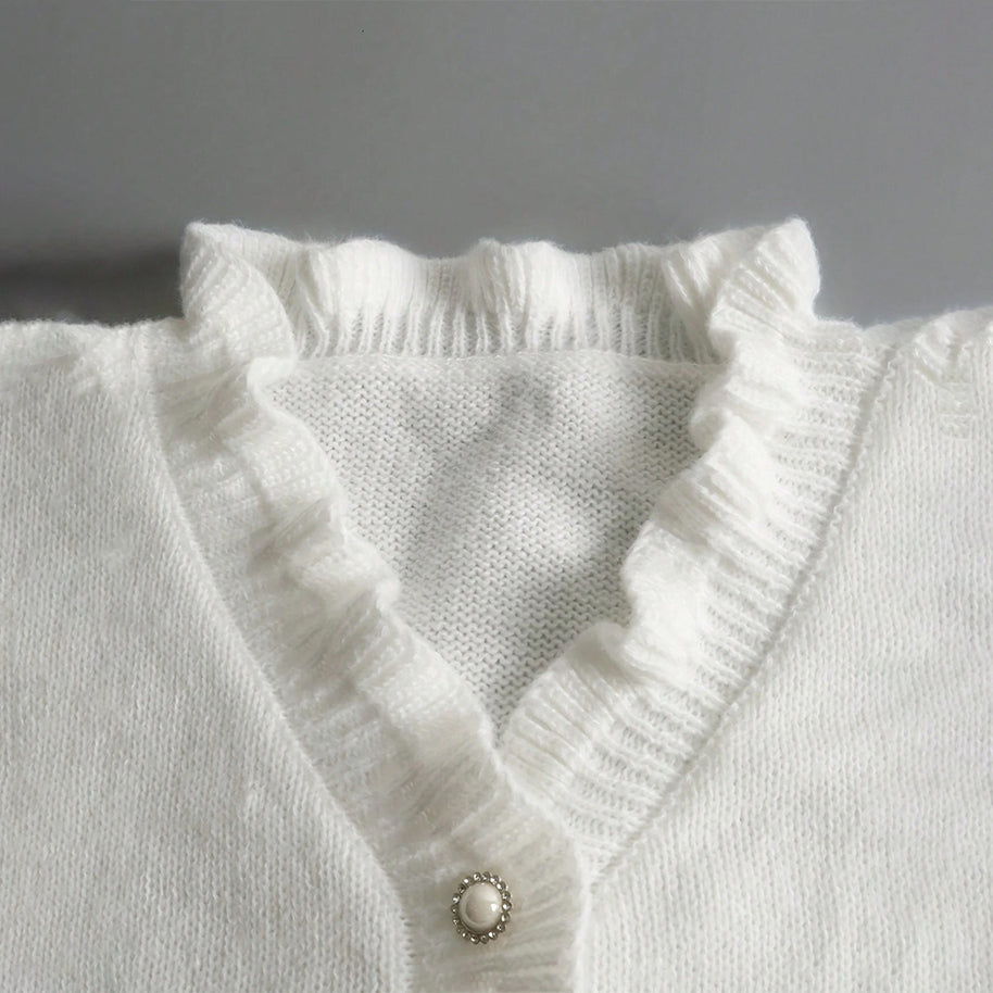 Damen Strickpullover mit Rüschendetails und perlenverzierten Knöpfen WW