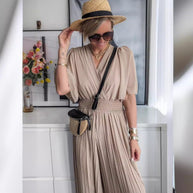 Damen Eleganter Jumpsuit mit tiefem V-Ausschnitt und voluminösen Ärmeln WW