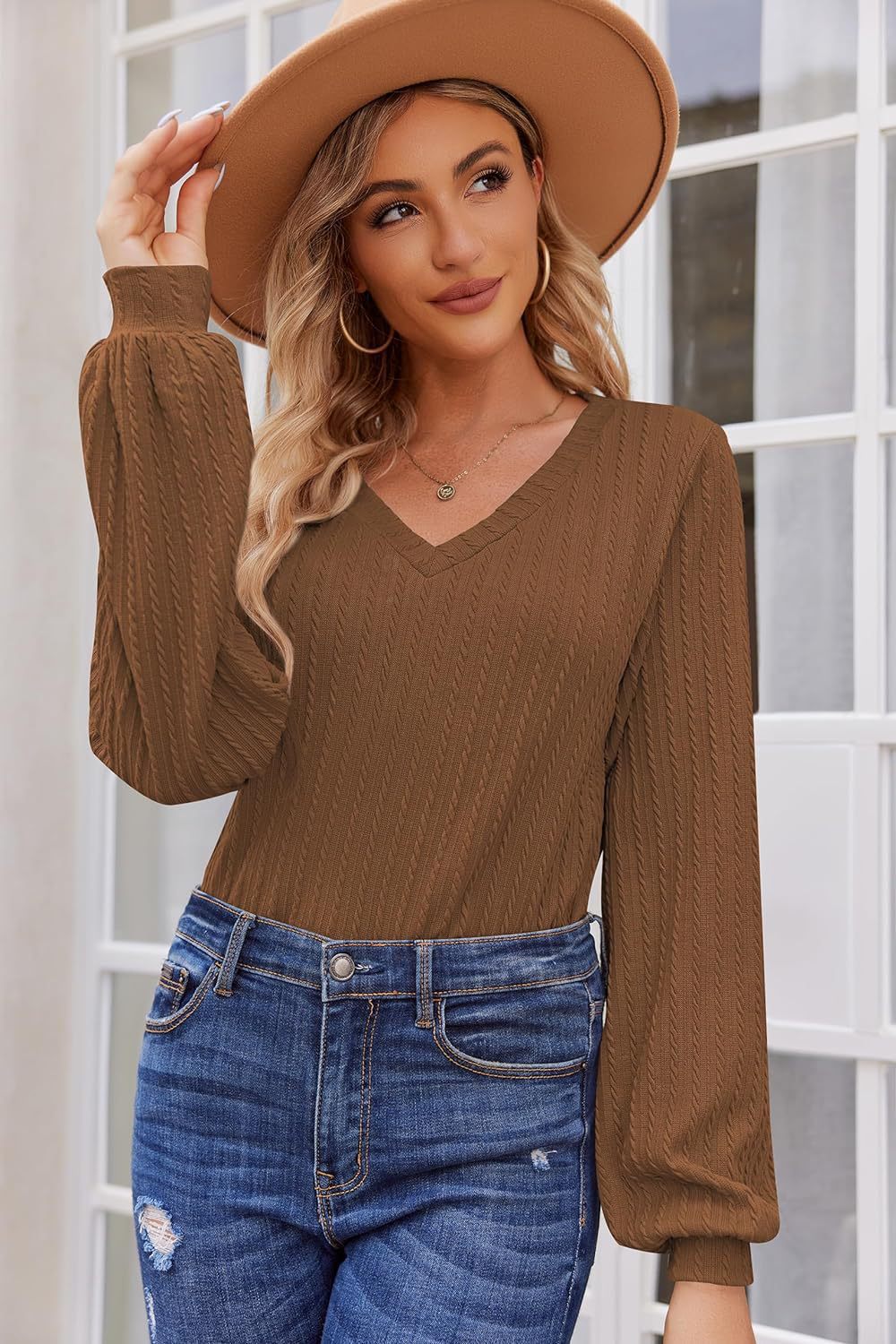 Damen Strickbluse mit feiner Rippstruktur und lässigem V-Ausschnitt WW