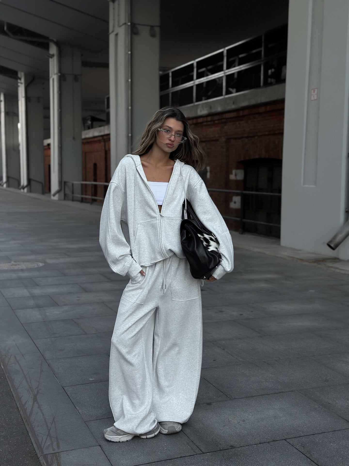 Damen bequeme und lässige Kapuzenjacke mit weitem Schnitt und passenden Jogginghosen WW